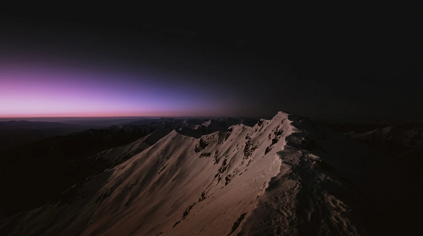 A snowy ridge at first light under lavender dusk, on grief and growth - The Endurant Way